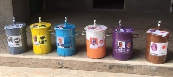 Ballot drums in which voters cast glass marbles in Saturday's general election (Photo Credit: IEC)